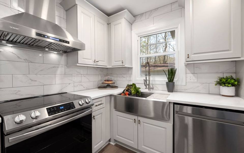 Under-cabinet ducted systems and permanent exhaust pathways